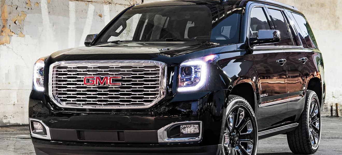 GMC Denali — a Executive luxury SUV in the Harmony Limo fleet, up to 6 passengers, used for MIA, FLL, PBI and Ocean Reef Club airport transfers, weddings, and nights out across South Florida
