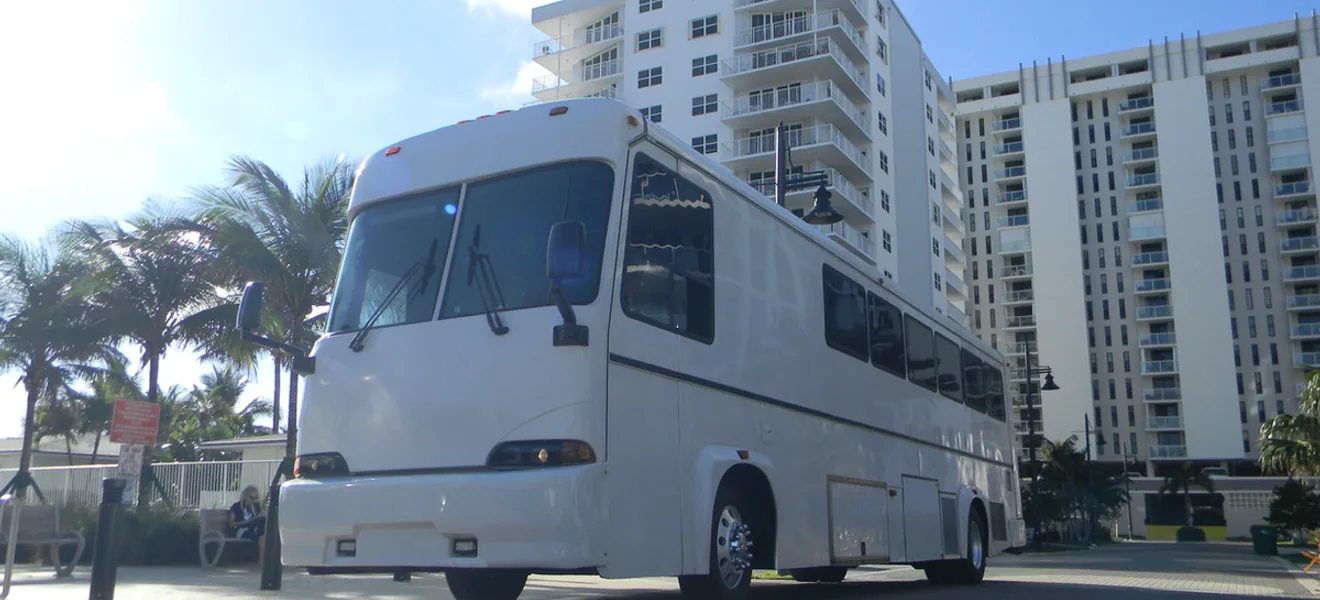 37-Passenger Party Bus — a Party bus in the Harmony Limo fleet, up to 37 passengers, used for MIA, FLL, PBI and Ocean Reef Club airport transfers, weddings, and nights out across South Florida